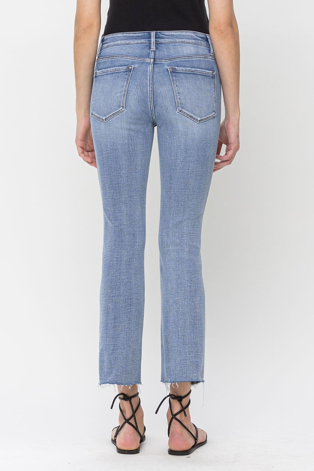 Distressed Raw Hem Mid Rise Kick Flare Jeans Triumph