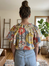 Double Flutter Sleeve Floral Tie Neck Blouse Mustard