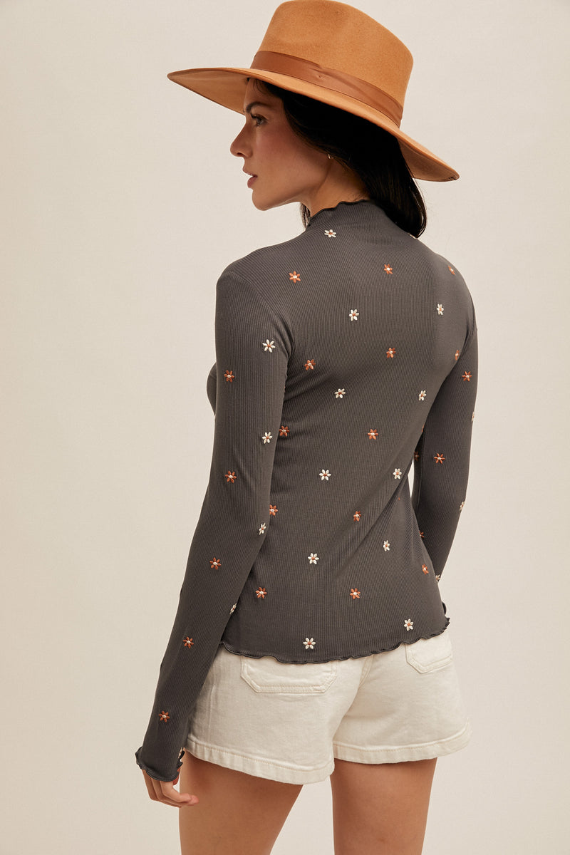 Embroidered Rib Mock Neck Cabbage Hem Top