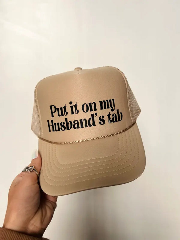 Put It On My Husband's Tab Trucker Hat