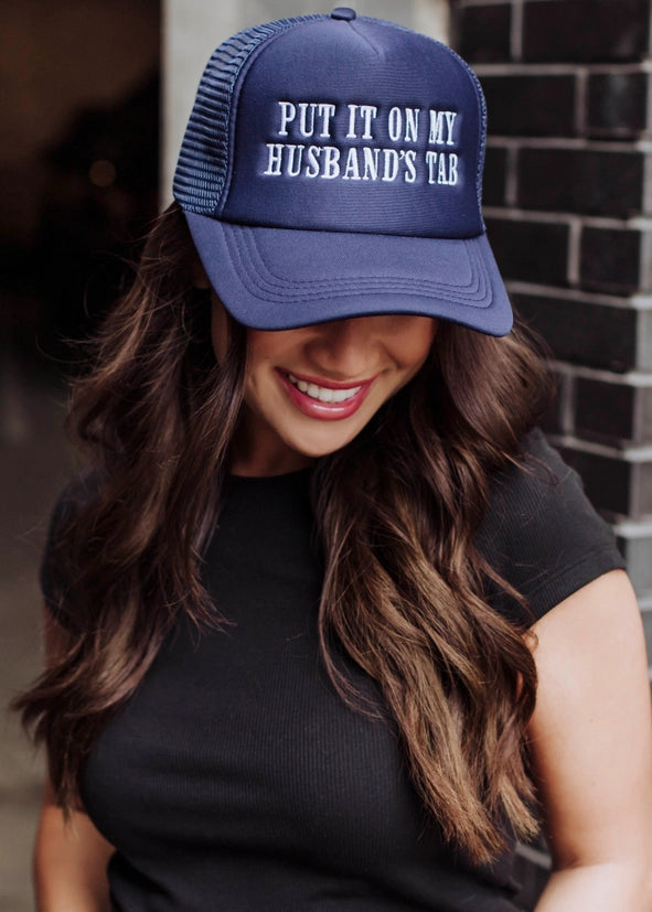 Put It on My Husband's Tab Trucker Hat