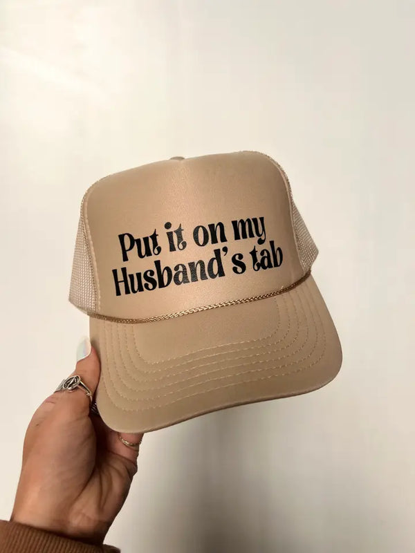 Put It On My Husband's Tab Trucker Hat